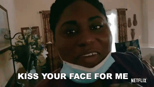 a woman wearing a face mask says kiss your face for me netflix