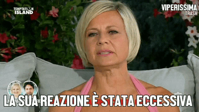 a woman is sitting on a couch with temptation island written on the bottom