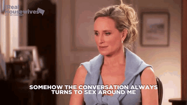 a woman is sitting in a chair with the words somehow the conversation always turns to sex around me