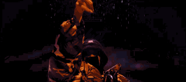 a person in a camouflage jacket is standing in the rain with their arms outstretched