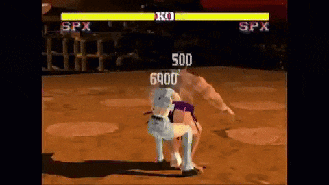 a video game is being played on a playstation and a dog is being thrown at a man .