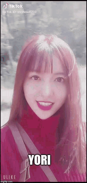 a girl with pink hair and a red turtleneck says " yori "