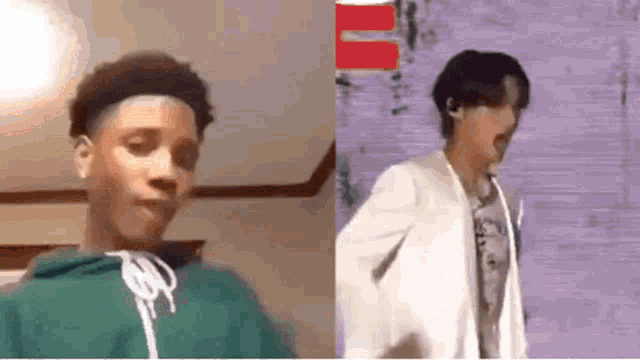 a young man in a green hoodie and a young man in a white jacket are dancing together .