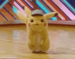 a pikachu wearing a hat is dancing on the floor .