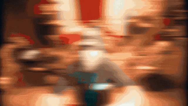 a blurry picture of a person with the word ' a ' on the bottom