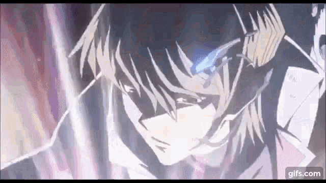 a close up of a person 's face with a glowing eye .