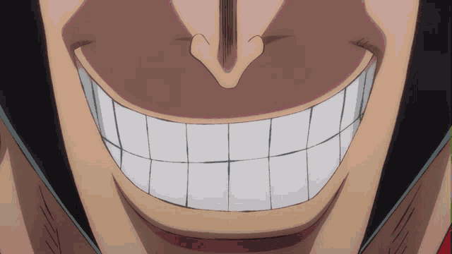 a close up of a man 's mouth with white teeth
