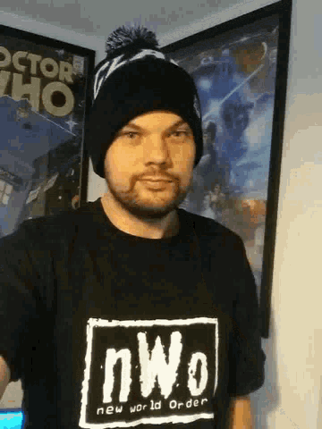 a man wearing a t-shirt that says nwo on it