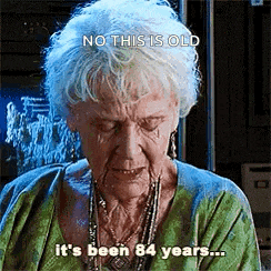 an elderly woman is crying with her eyes closed and says `` no this is old it 's been 84 years ... ''