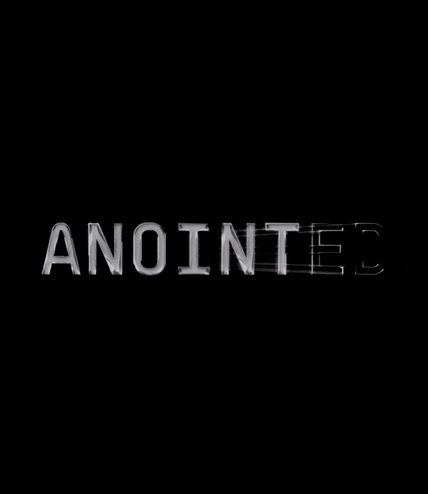a black background with the word anointed written in white letters