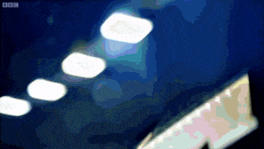 a bbc logo is displayed on a dark background
