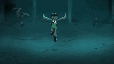 a group of cartoon characters are fighting each other and a boy is sitting in the middle .