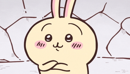 a cartoon drawing of a bunny with pink cheeks and ears