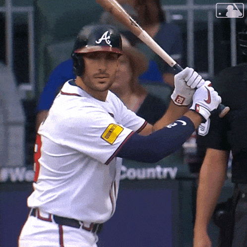 a baseball player with the letter a on his cap