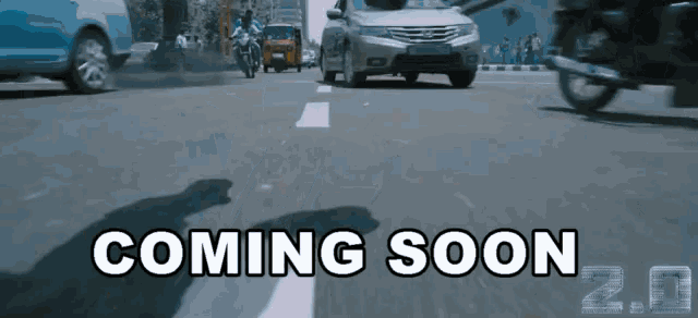 a sign that says coming soon 2.0 is on the road