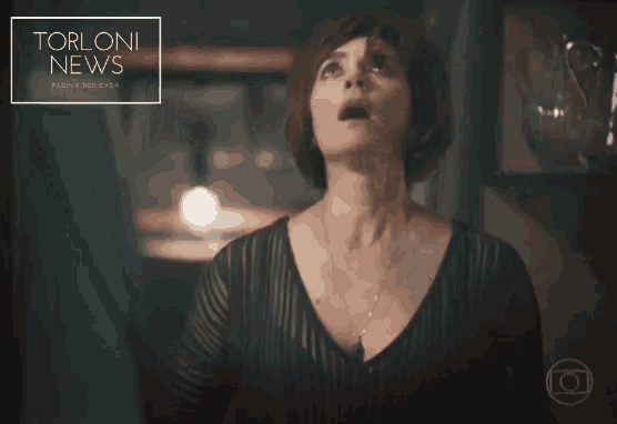a woman looking up with a torloni news advertisement in the background