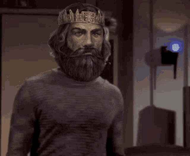 a man with a beard and a crown on his head is giving a thumbs up and says nice