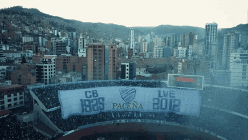 an aerial view of a stadium with a banner that says cb 1925 pacena