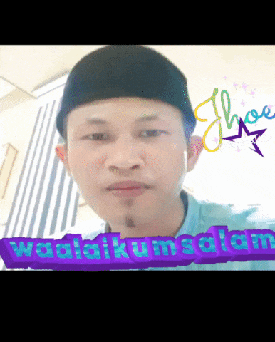 a man wearing a black hat and a blue shirt with the words waalaikumsalam on the bottom right