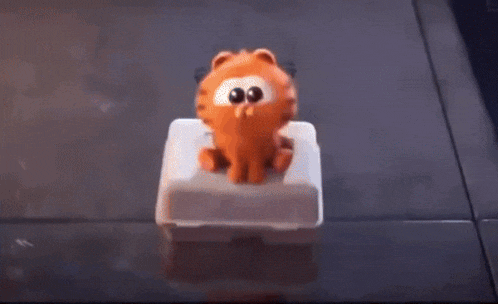 garfield is talking to a boy in a cartoon