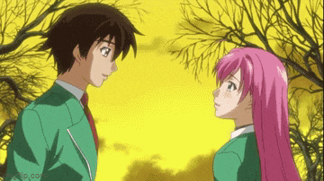 a boy and a girl are looking at each other in front of a yellow background