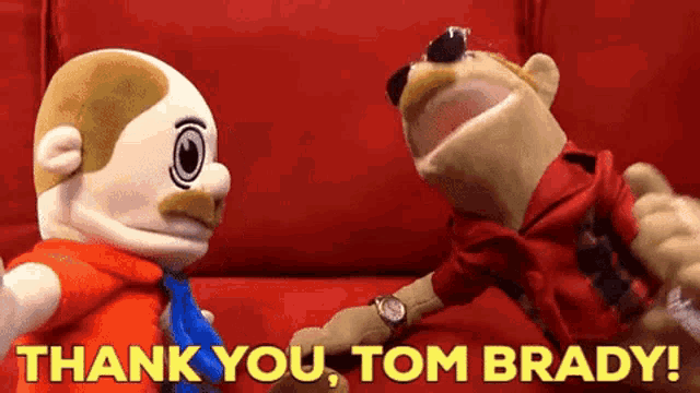 two stuffed animals are standing next to each other with the words thank you tom brady above them