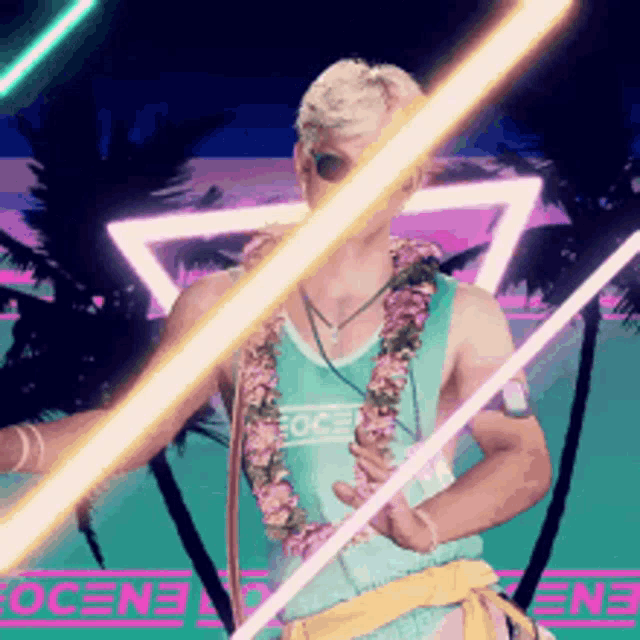 a man wearing a tank top that says eoce