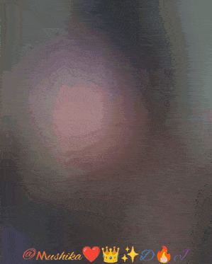 a picture of a woman with the name mushika on the bottom right