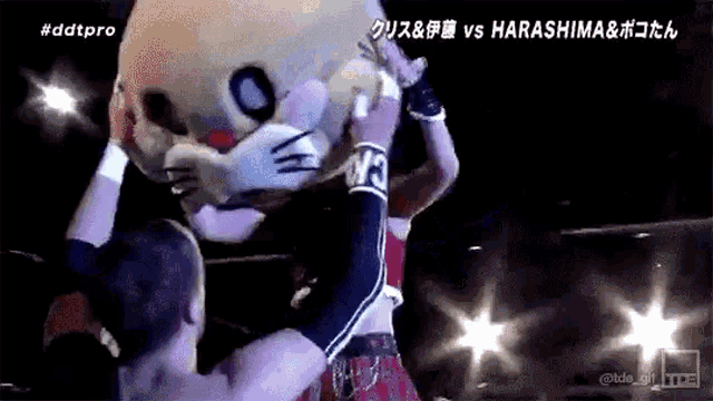 a man in a mascot costume is being lifted by another man