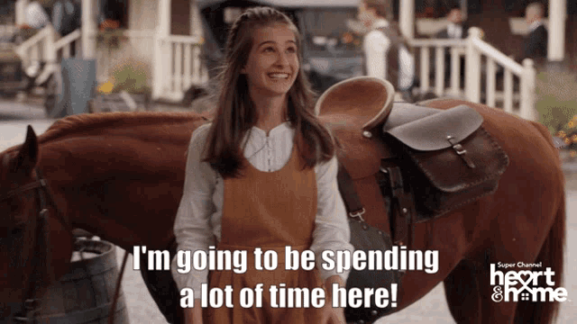 a girl standing next to a horse with the words " i 'm going to be spending a lot of time here "