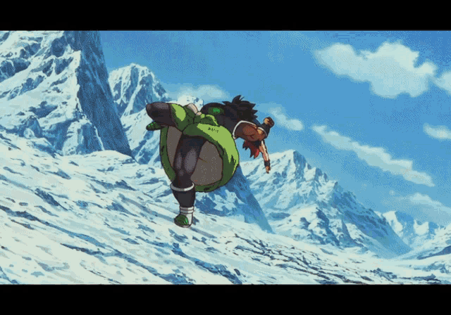 a person in a green outfit is walking down a snowy mountain