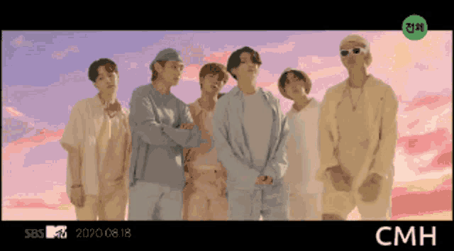 a group of people standing next to each other with cmh written on the bottom right