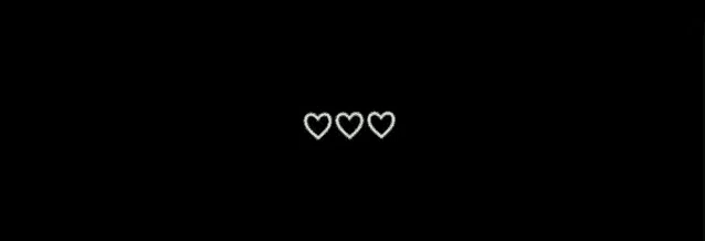 three hearts are drawn on a black background .