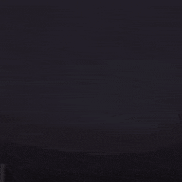 a close up of a fire explosion in the dark