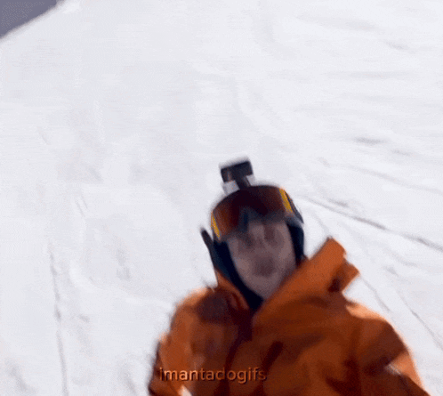 a blurry picture of a person wearing a helmet and goggles with the words imantad gifs in the corner