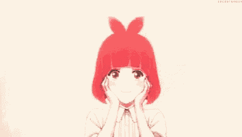 a girl with red hair and a bow on her head is smiling .