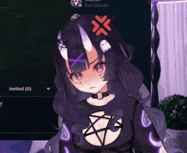 a girl with horns and a pentagram on her chest is sitting in front of riot mobile