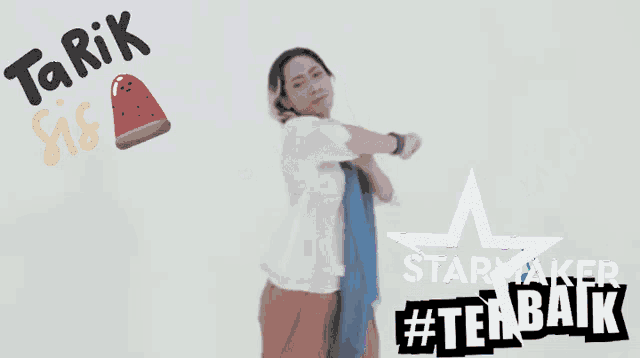 a woman dancing in front of a watermelon and the words tarik sis starmaker #terbaik