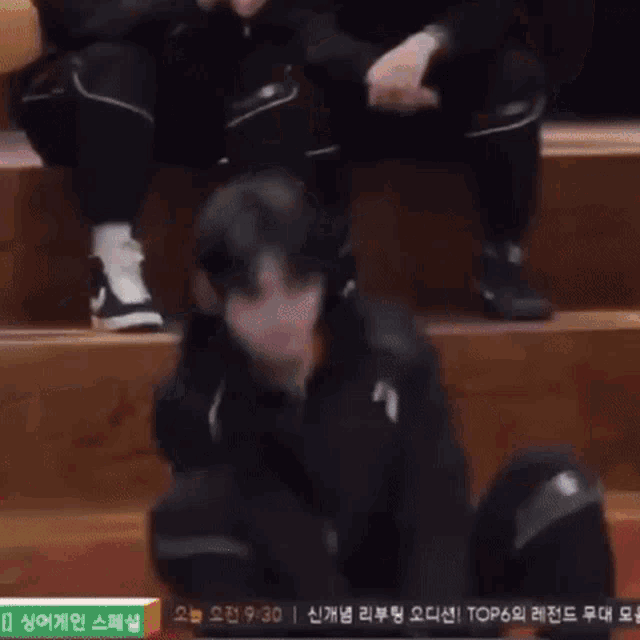 a man is laying on his back with the number 1 on his back