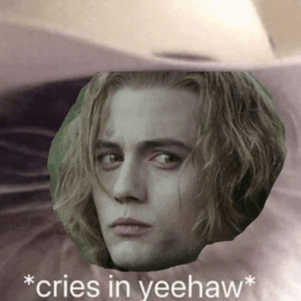 a close up of a man 's face with the words * cries in yeehaw * below it