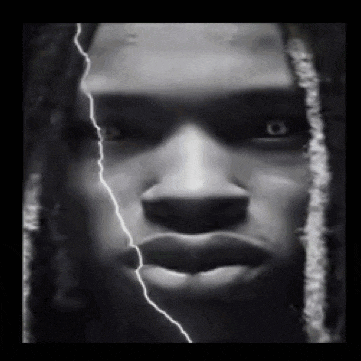 a black and white photo of a man 's face with a lightning bolt coming out of it