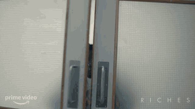 a prime video ad for riches shows a man looking through a door