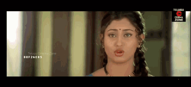 a screenshot of a telugu cinema zone showing a woman