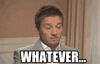 a man in a suit and tie is making a face and saying whatever .