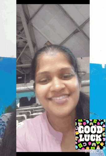 a picture of a woman with a good luck sticker