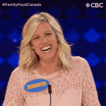 a woman with a name tag on her that says jennifer