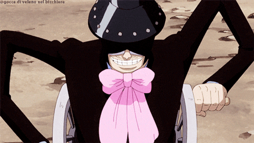 a man wearing a black hat and a pink bow tie holds a cannon