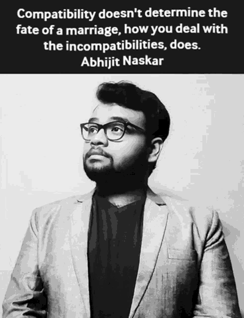 a man wearing glasses and a suit has a quote from abhijit naskar
