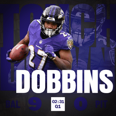 a ravens football player named dobbins is running with a football