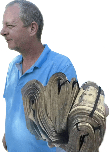 a man in a blue shirt is holding a stack of twenty dollar bills